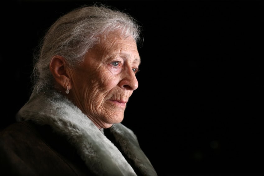 Photo of contemplative senior woman