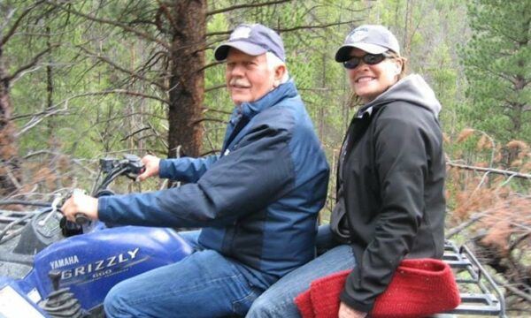 Photo of couple on a Yamaha Grizzly four wheeler